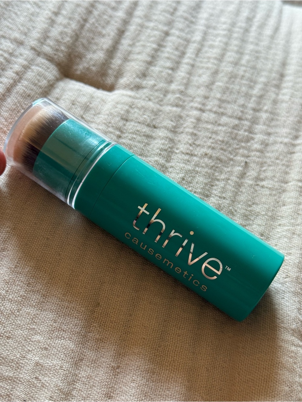 Thrive Causemetics highlighter stick